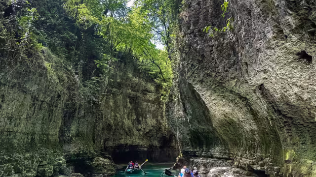 Martvili Canyon, Georgia - 2023.06.07: Tourists in rubber boats enjoying views of  Abasha river erosion canyon located in Samegrelo region of Western Georgia.