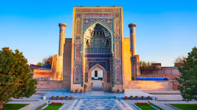 Guri Amir or Gur Emir is a mausoleum of the Mongol conqueror Amir Temur or Tamerlane in Samarkand, Uzbekistan at sunset