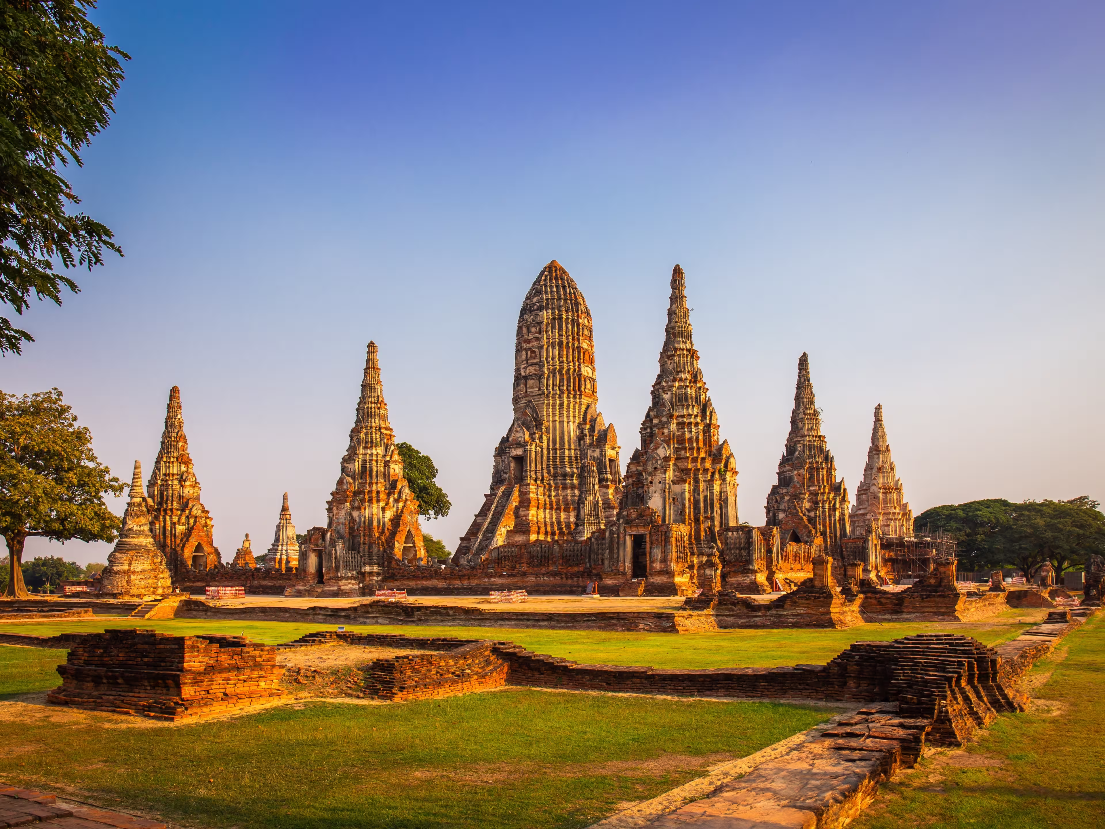 Wat Chaiwatthanaram temple at sunset in a historical park in Ayutthaya, Thailand is popular destination and landmark for tourists.