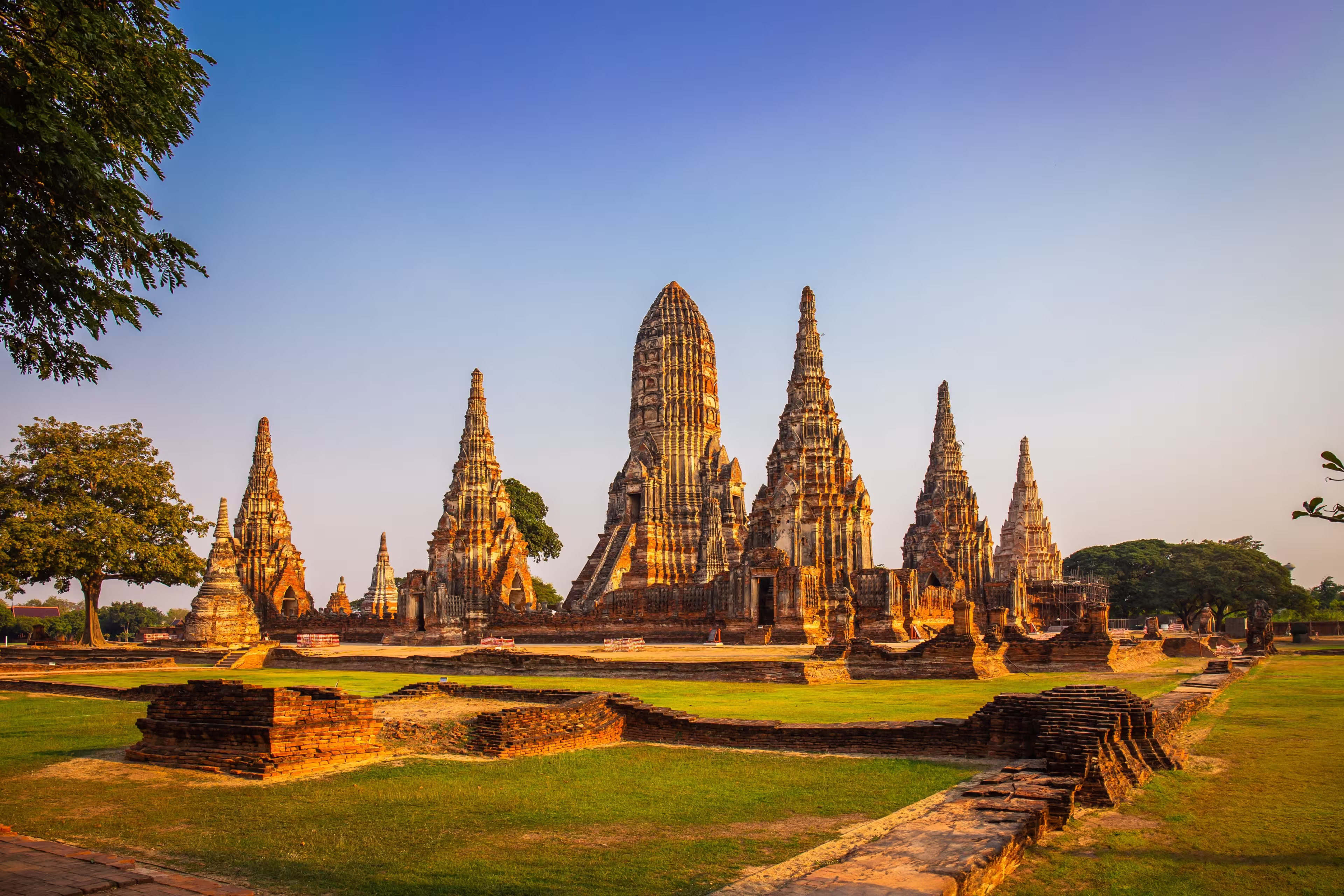 Wat Chaiwatthanaram temple at sunset in a historical park in Ayutthaya, Thailand is popular destination and landmark for tourists.