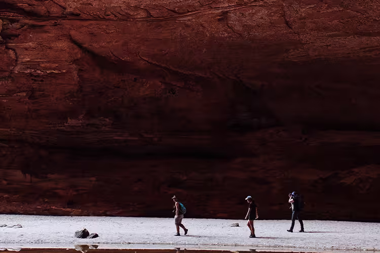 Travellers through Cathedral gorge in Purnululu NP, Western Australia