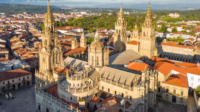 Aerial view of the Cathedral of Santiago de Compostela at sunrise in Galicia, Northern Spain. Renowned Christian pilgrimage site and final destination of the historic Camino de Santiago route.