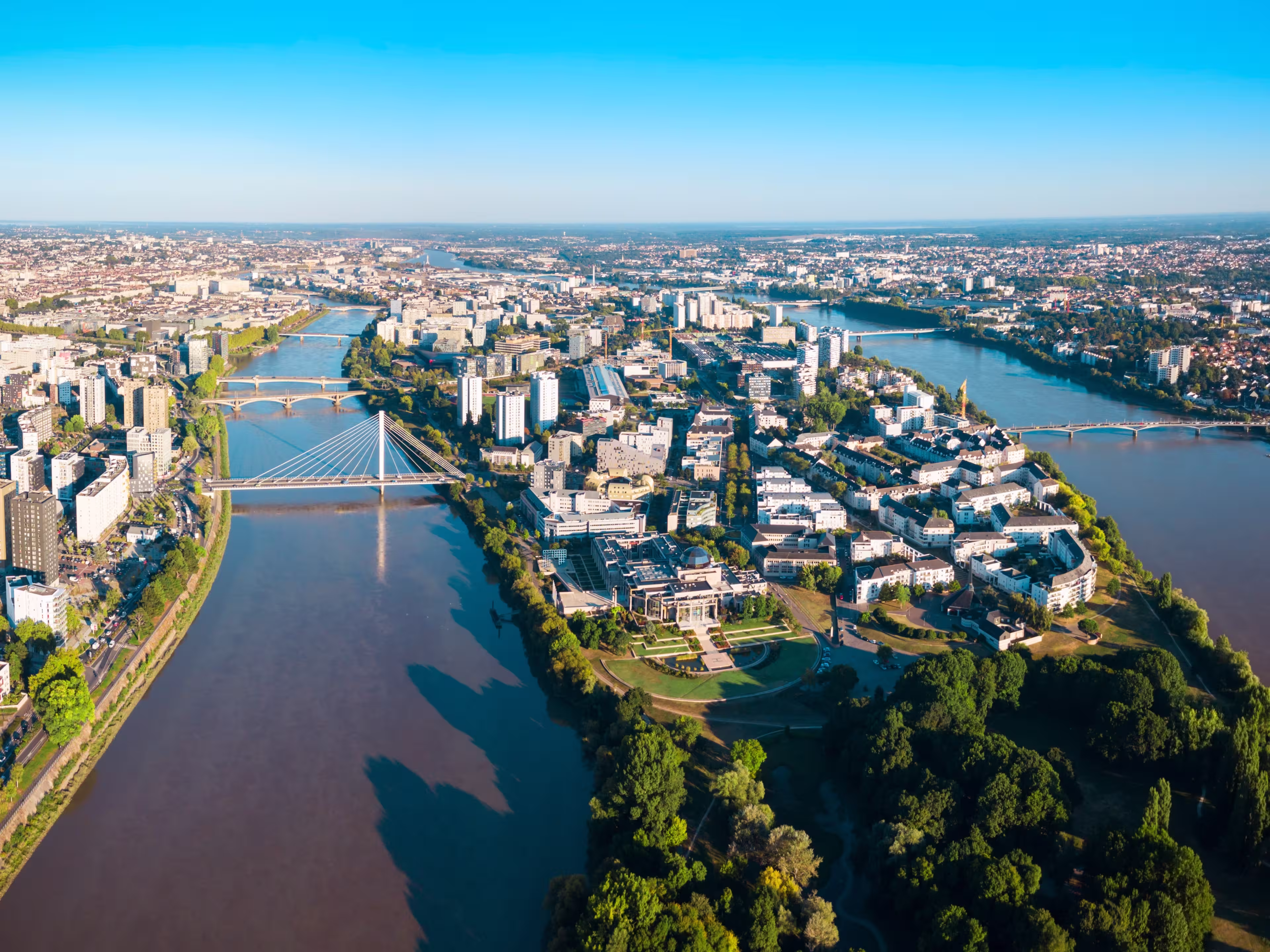 Nantes city between the branches of the Loire river aerial view in Loire-Atlantique region in France