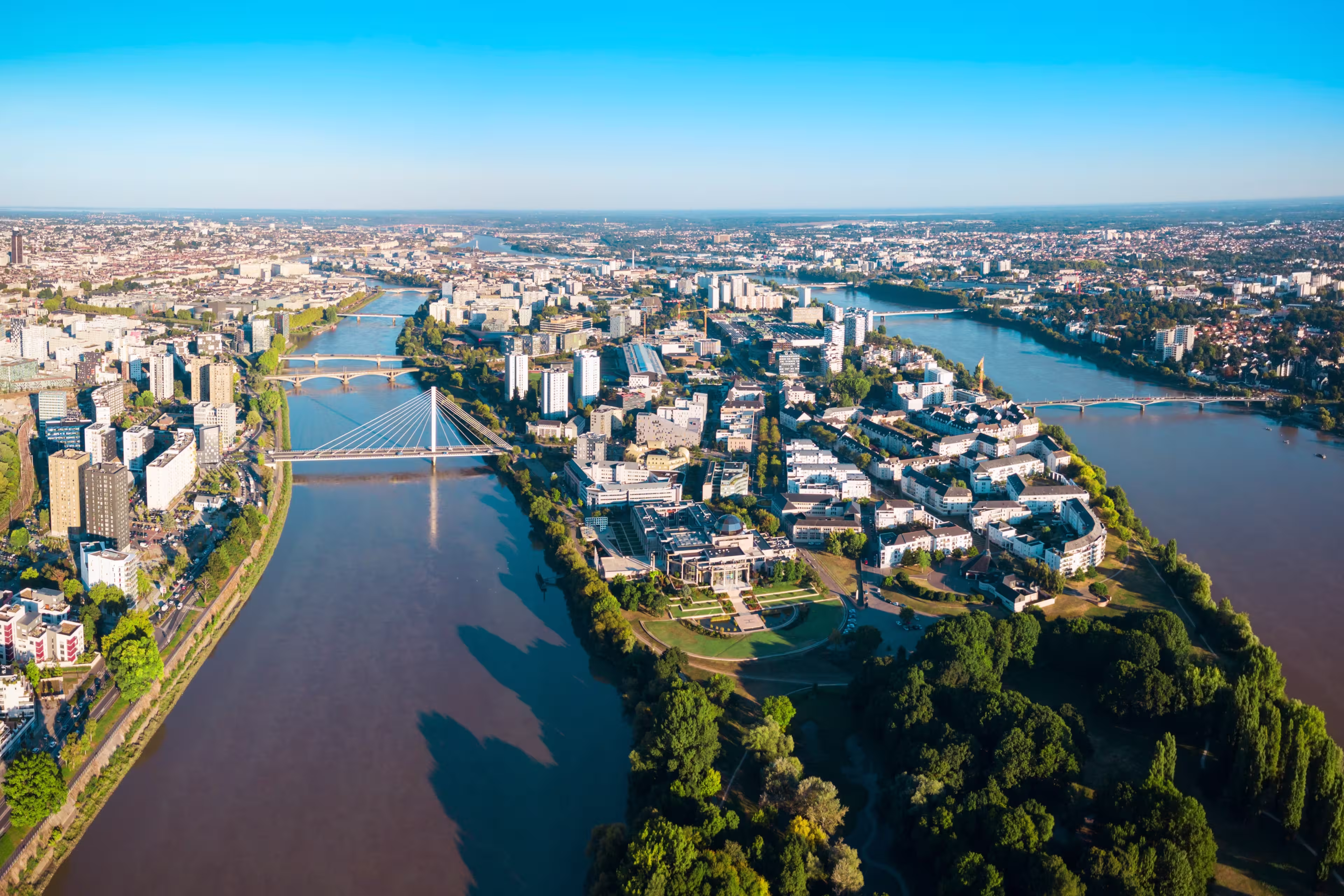 Nantes city between the branches of the Loire river aerial view in Loire-Atlantique region in France