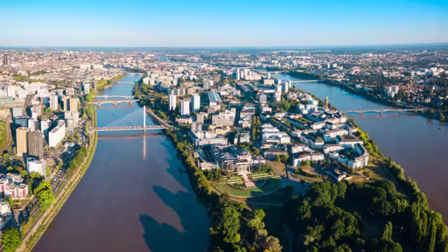 Nantes city between the branches of the Loire river aerial view in Loire-Atlantique region in France