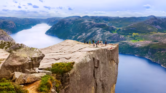 Cliff Preikestolen in fjord Lysefjord - Norway - nature and travel background