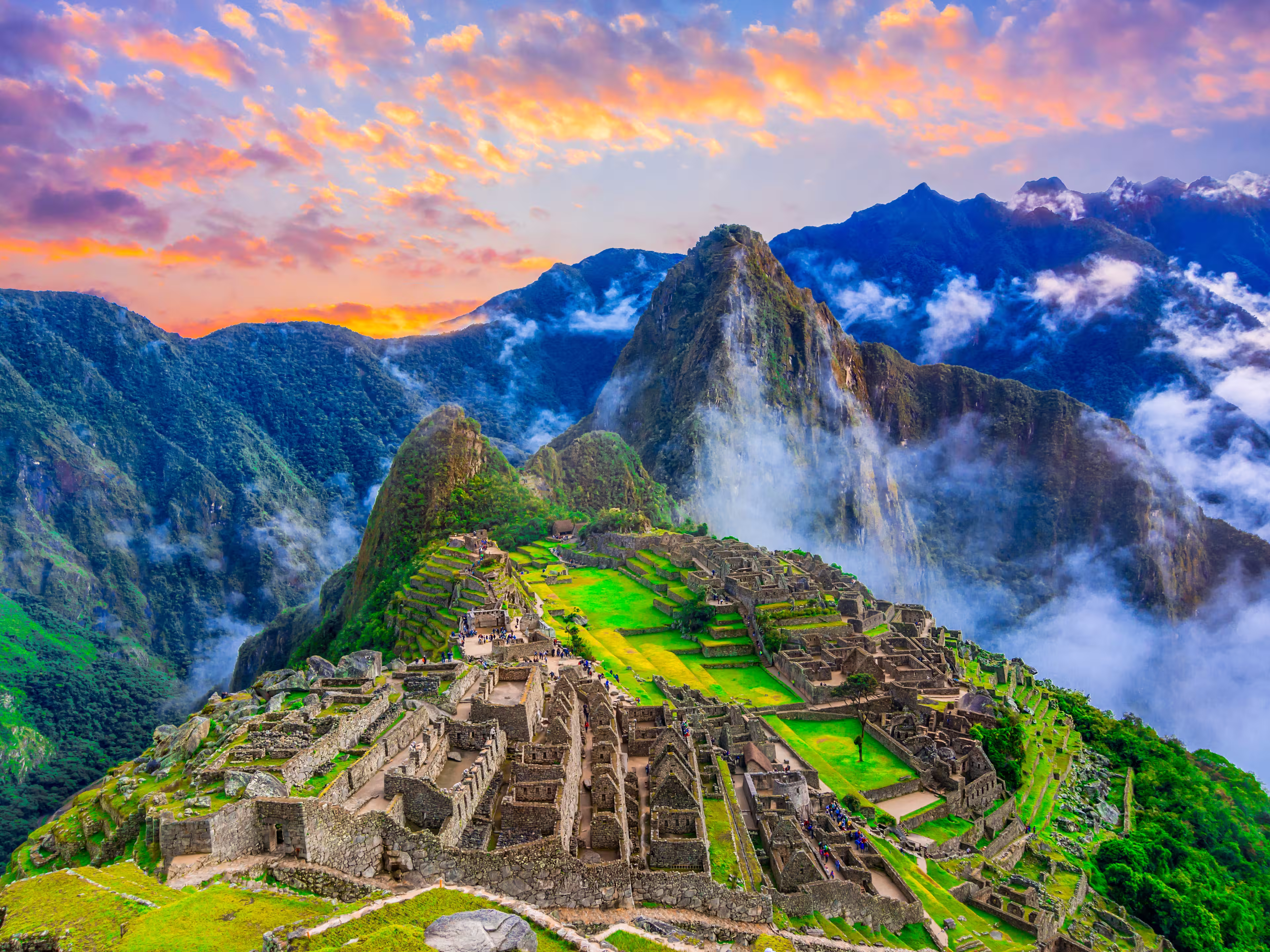 Machu Picchu, Cusco,Peru: Overview of the lost inca city Machu Picchu, agriculture terraces and Wayna Picchu, peak in the background,before sunrise