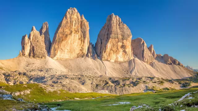 Famous Tre Cime di Lavaredo at summer time. Landscape of Alps Mountains.  Dolomites, Alps, Italy, Europe (Drei Zinnen)