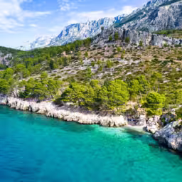 Attractive morning seascape of Adriatic sea. Marvelous summer view of small beach in famous resort - Tucepi, Makarska Croatia, Europe. Beautiful world of Mediterranean countries.