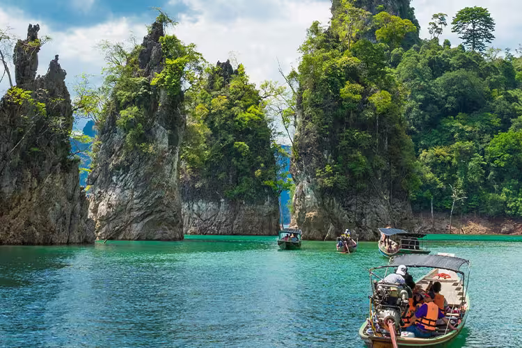 Travellers cruising through Khao Sok by boat