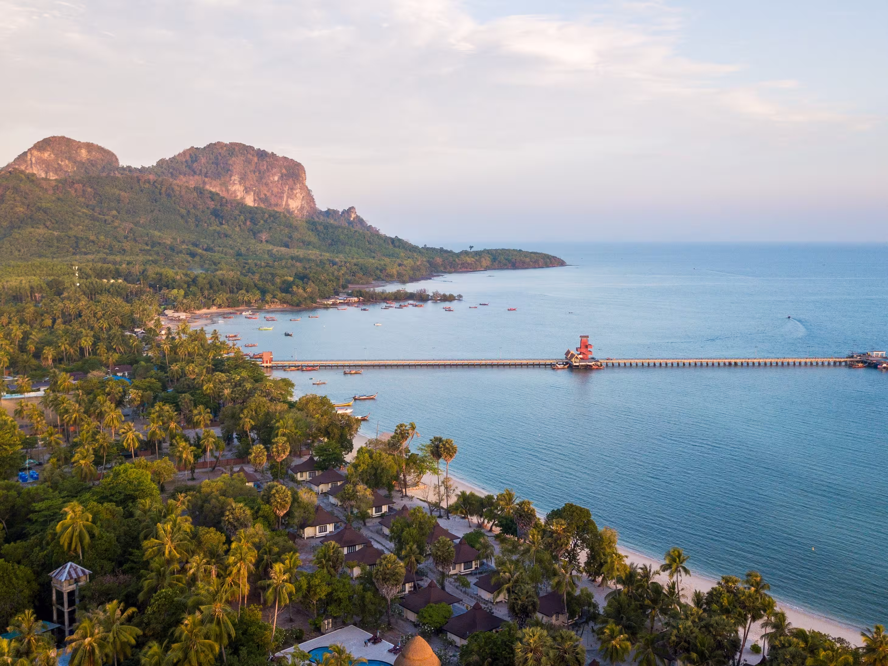 aerial view of koh mook with Pier.It is a small idyllic island in the Andaman Sea in the south of Thailand. Much of the island consists of deep jungle and intact nature