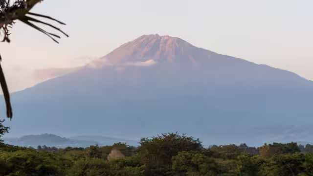 Impression of Mount meru, as seen from the town of Arusha, Tanzania