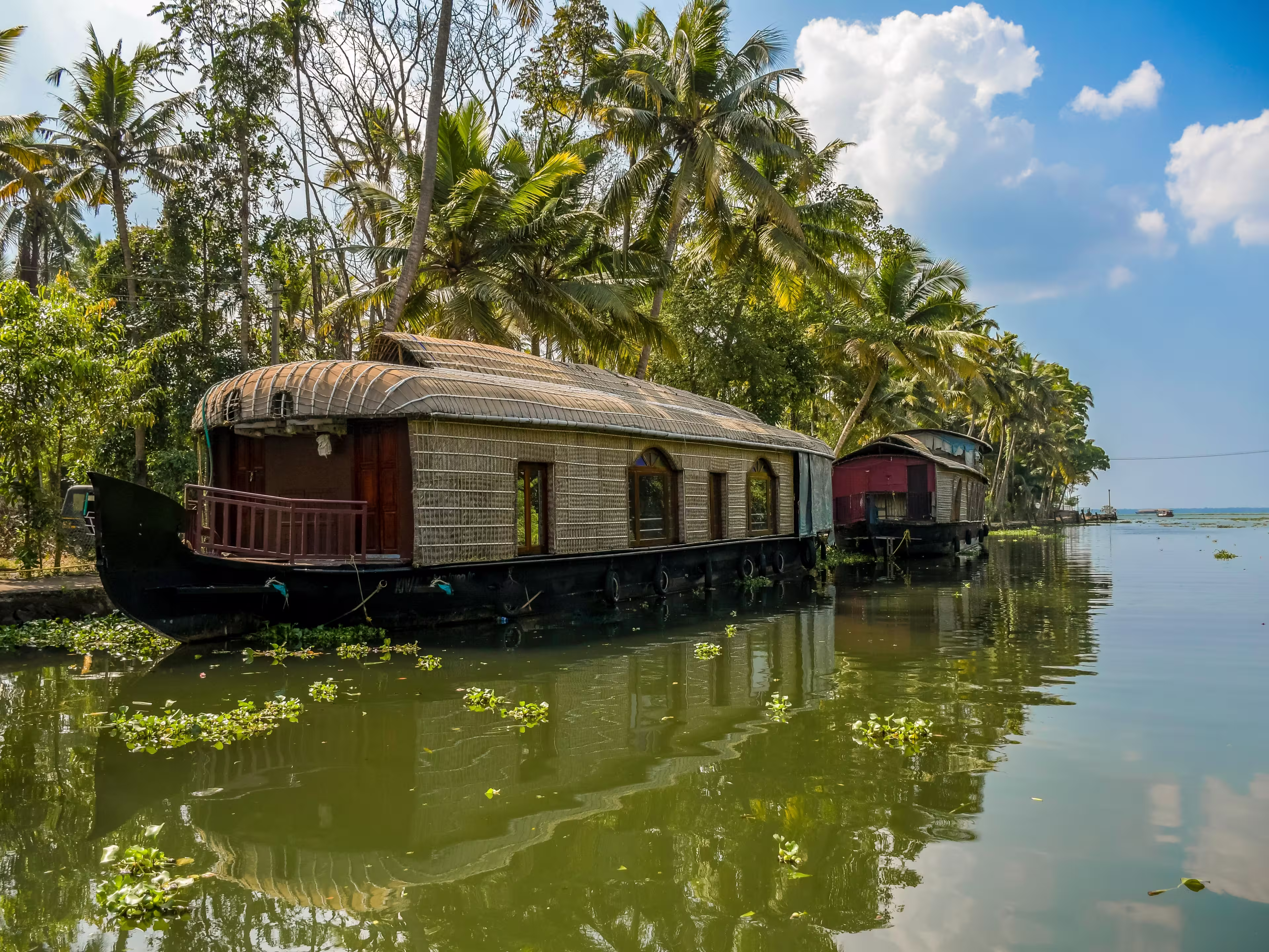 Kerala backwater and boathouse in Kumarakom is a top tourism attraction of India