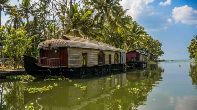 Kerala backwater and boathouse in Kumarakom is a top tourism attraction of India