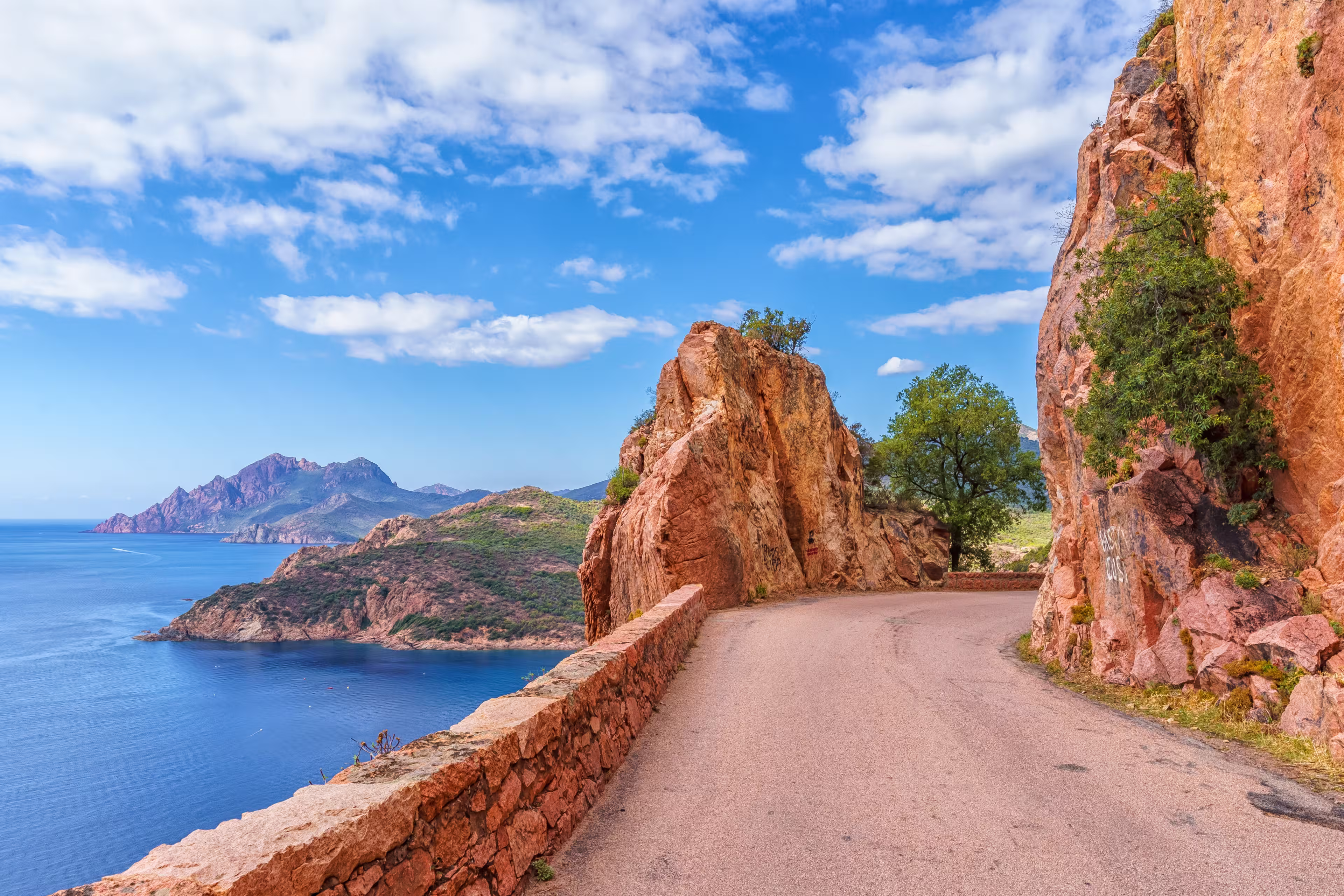Landscape with mountain road in Calanques de Piana, Corsica island, France