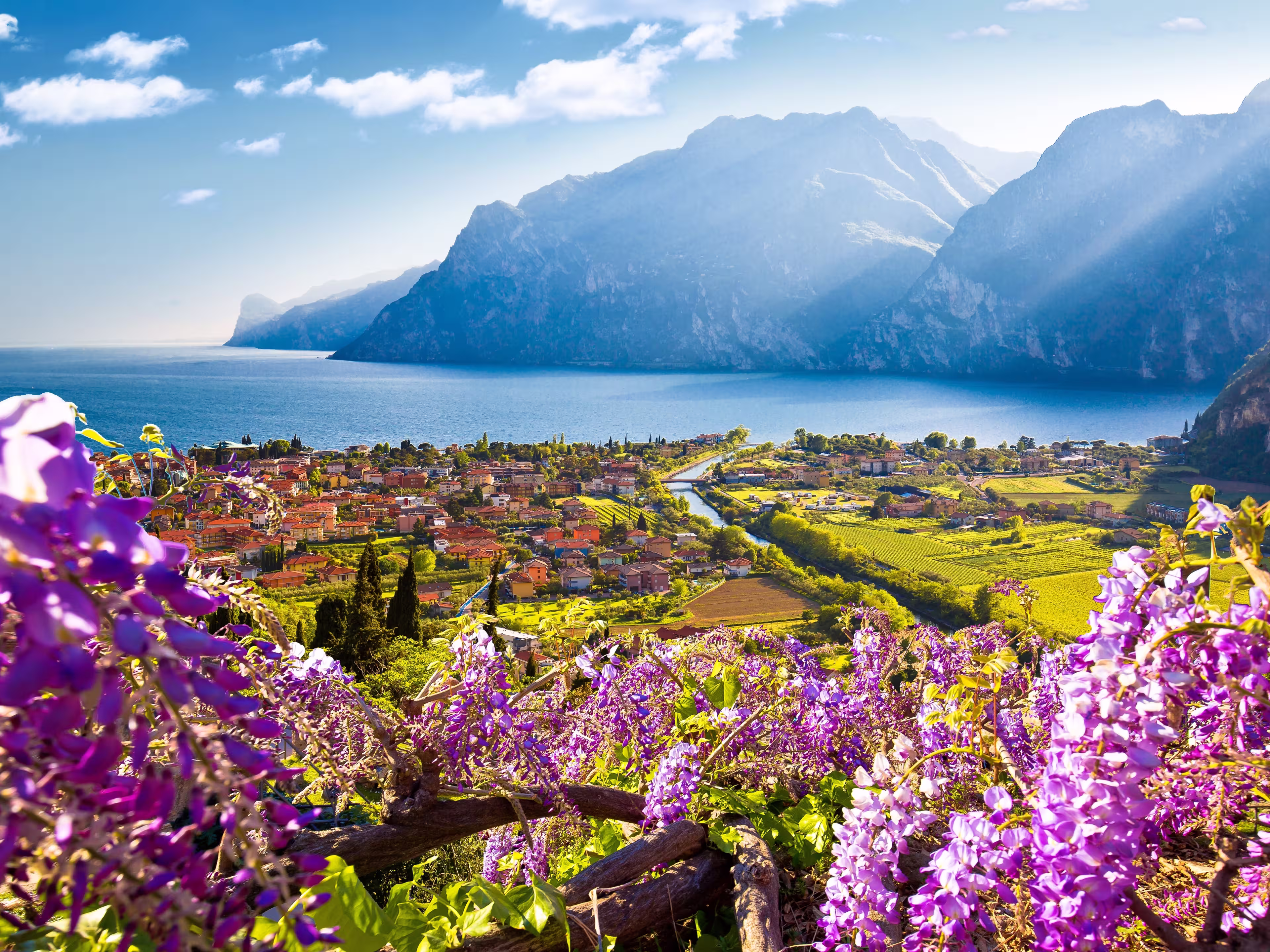 Town of Torbole and Lago di Garda sunset view, Trentino Alto Adige region of Italy