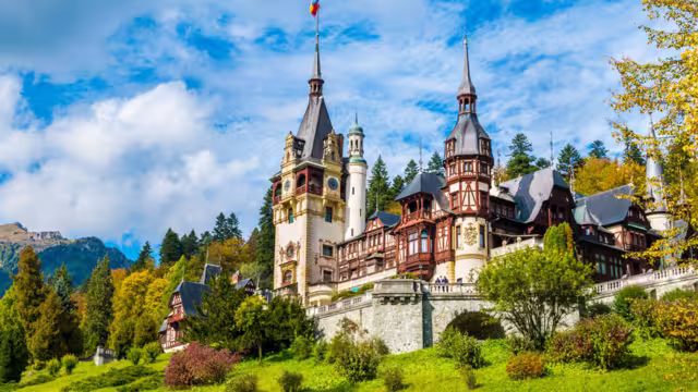 Gilded and elaborately decorated Peles Castle in the mountains of Transylvania, Romania