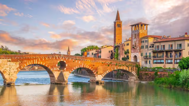 Verona city downtown skyline, cityscape of Italy at sunset