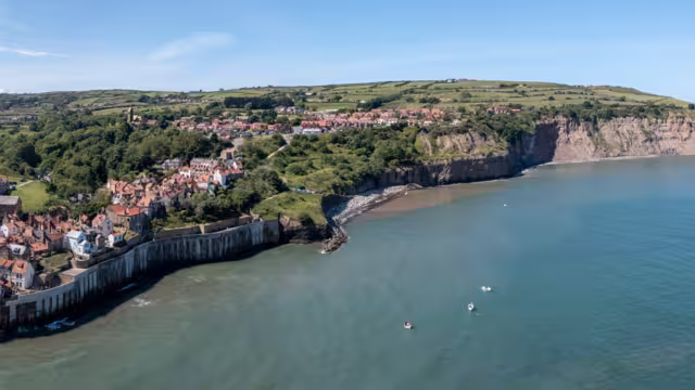 robin hoods bay near whitby north yorkshire sunny summer day elevated panoramic view high tide