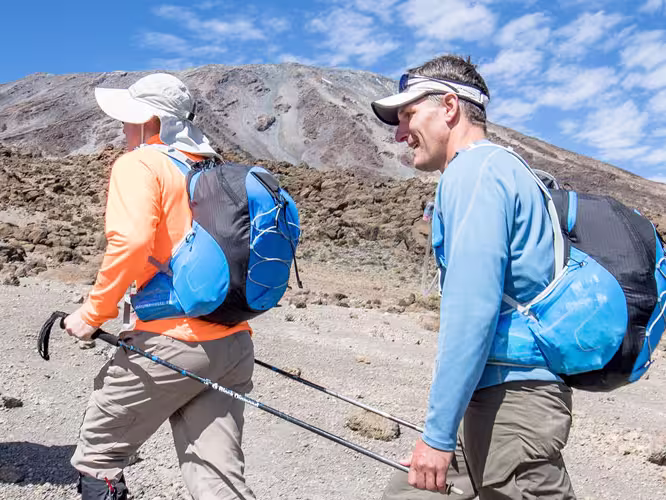 Travellers begin the hike to Mount Kilimanjaro