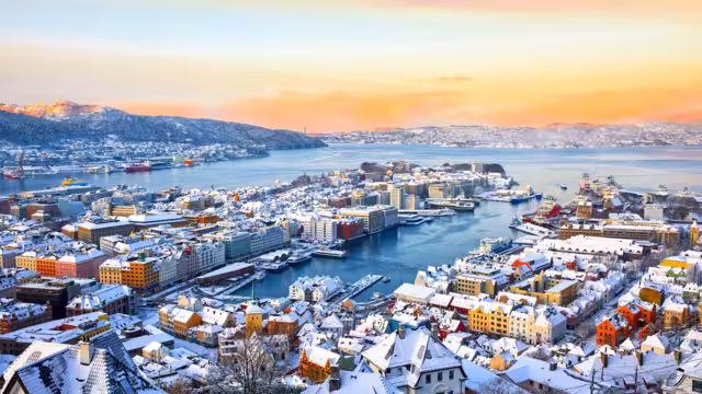Amazing view of Bergen harbor in winter at sunrise, Norway
