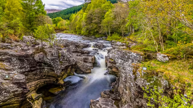 A long exposure view of the falls at Invermoriston, Scotland on a summers day