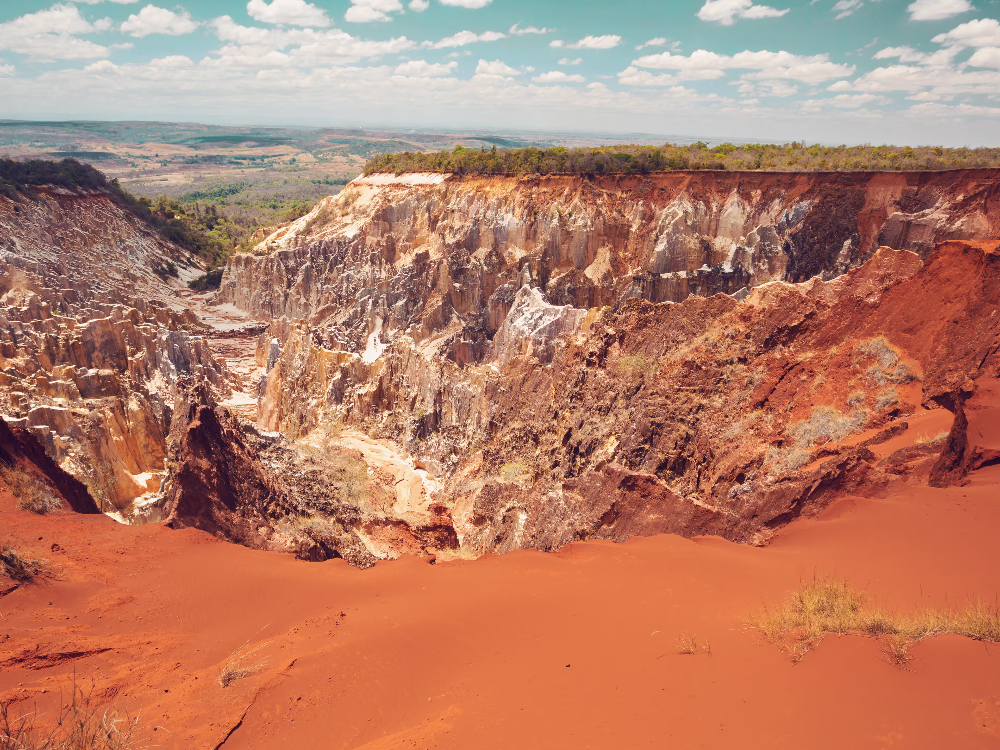 Lavaka of Ankarokaroka erosion canyon in Ankarafantsika National Park, incredible moonscape with dry forest and lake, Boeny Region of Northwest Madagascar