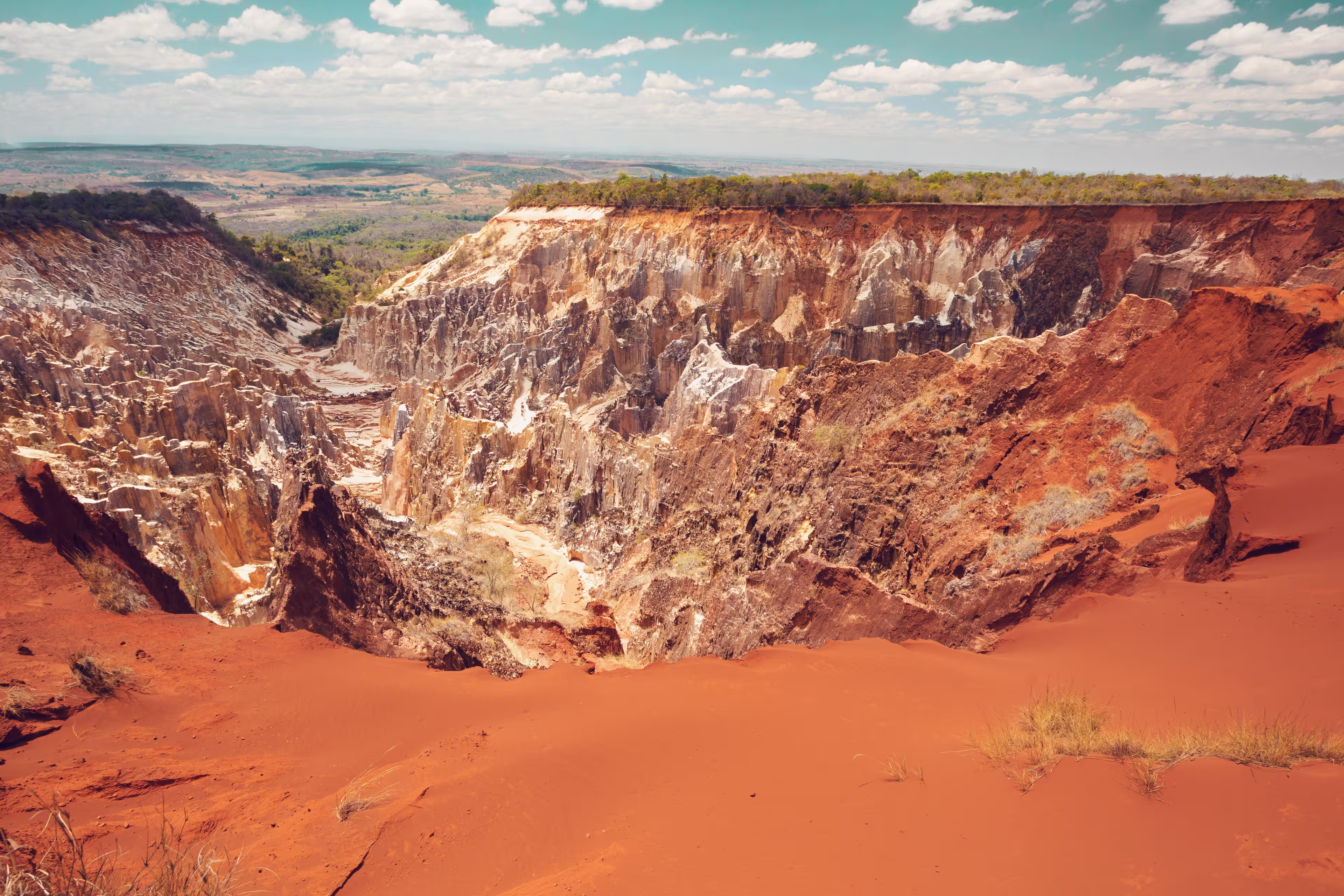 Lavaka of Ankarokaroka erosion canyon in Ankarafantsika National Park, incredible moonscape with dry forest and lake, Boeny Region of Northwest Madagascar