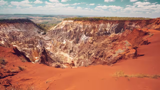 Lavaka of Ankarokaroka erosion canyon in Ankarafantsika National Park, incredible moonscape with dry forest and lake, Boeny Region of Northwest Madagascar