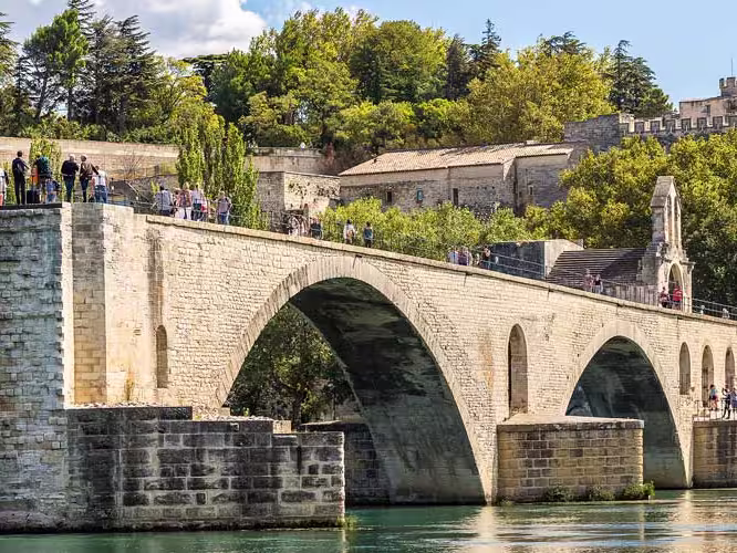 Saint benezet bridge meets canal in Avignon France