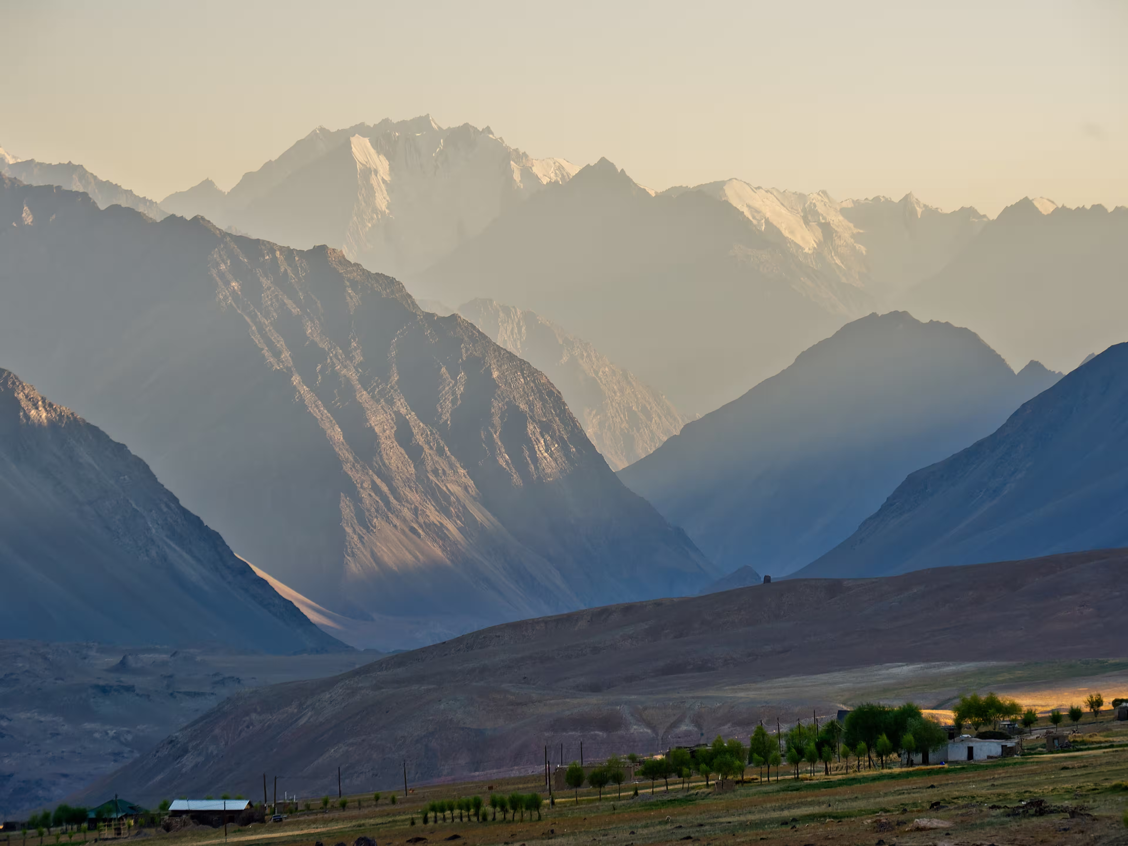 From the village of Roshorv, located above the Bartang Valley, you can look south toward the rugged mountains of the Rushan Range. Pamir, Tajikistan.