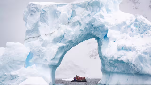 Take in the signifcant scale of Antarctica's ice on a zodiac cruise