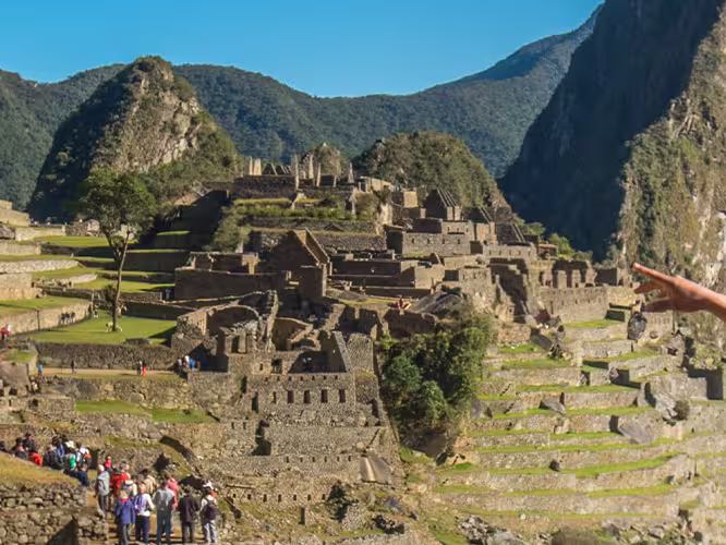 GGPI - Leader with male traveller in front of Machu Picchu, Peru