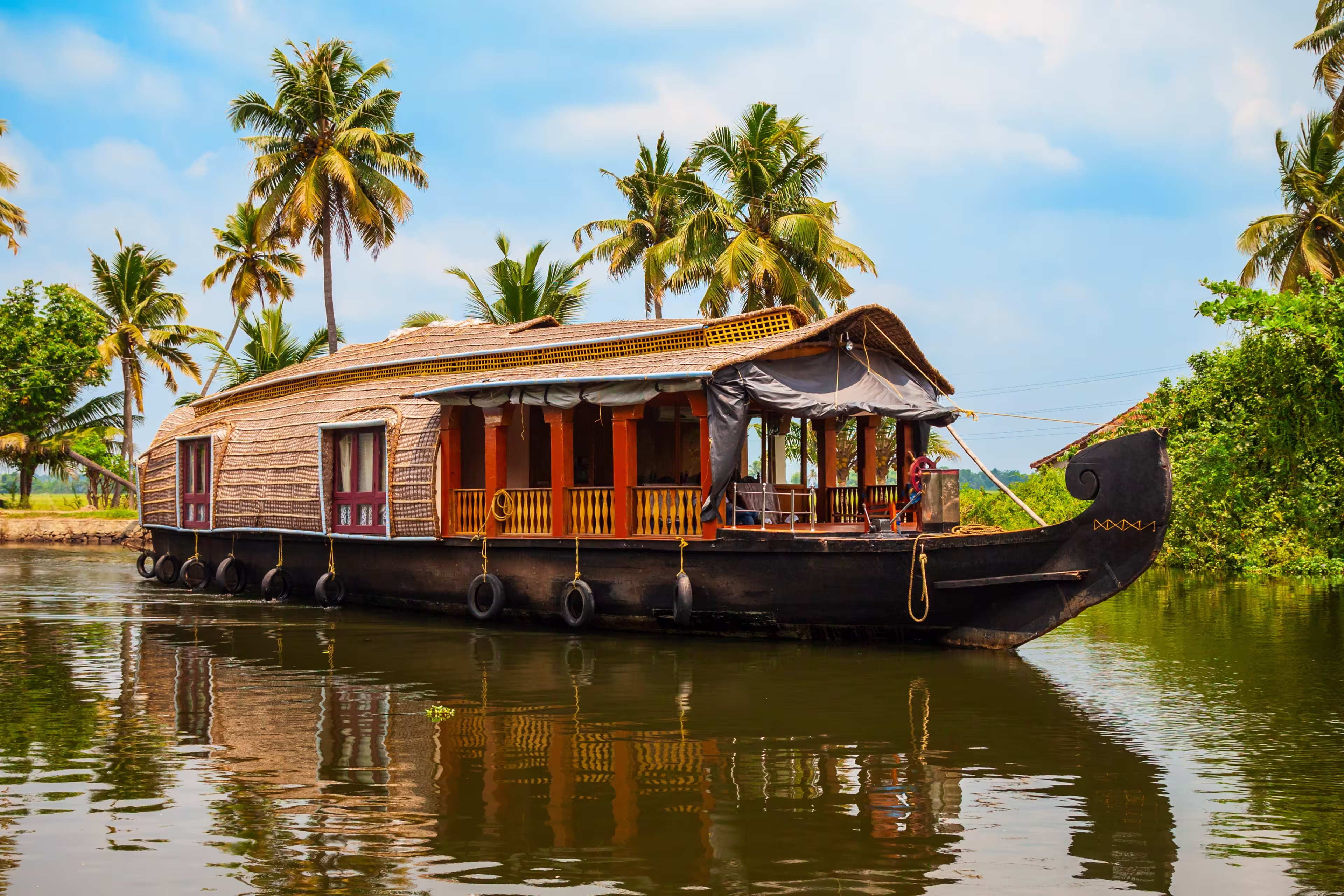 A houseboat sailing in Alappuzha backwaters in Kerala state in India