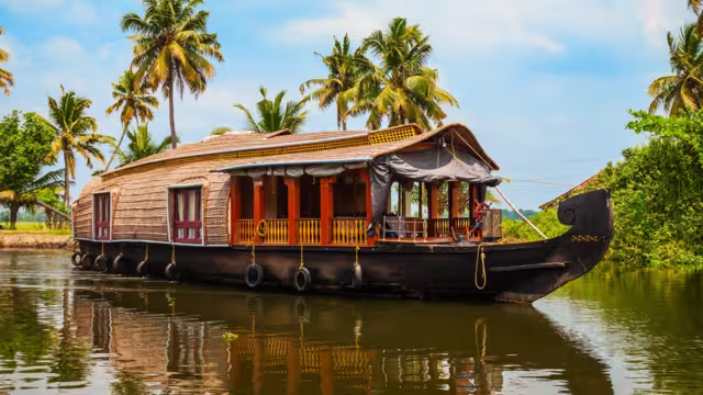 A houseboat sailing in Alappuzha backwaters in Kerala state in India