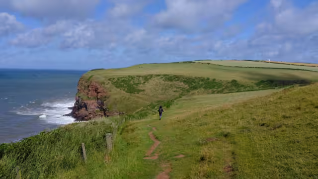 Hiking the national trail UK coast to coast route from st Bees to Robin Hoods Bay