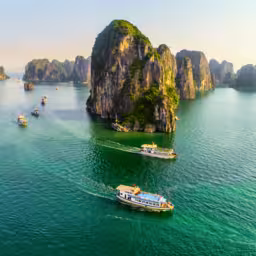 Dreamy sunset landscape Halong Bay, Vietnam view from adove. This is the UNESCO World Heritage Site, a beautiful natural wonder in northern Vietnam