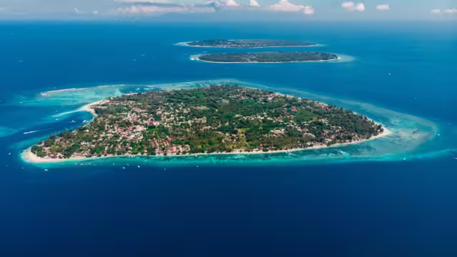 Aerial view with Gili islands and ocean. Gili Air, Meno and Trawangan islands