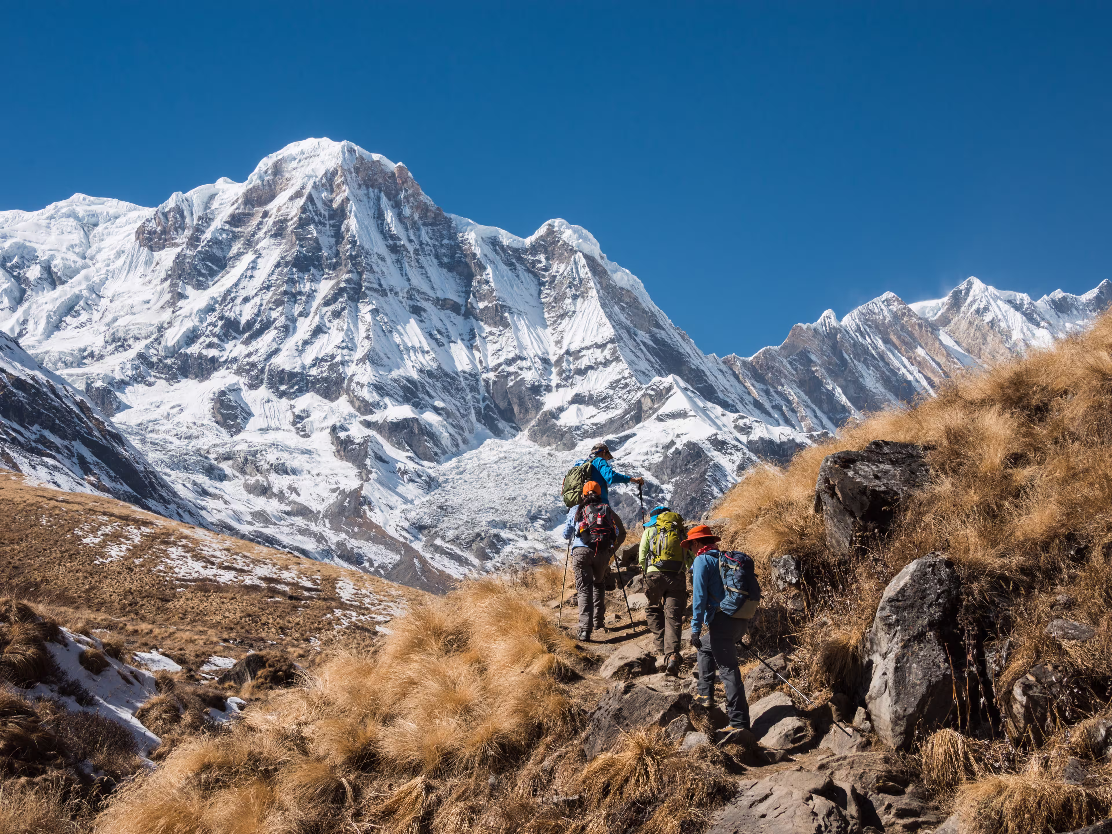 Trekking in Annapurna region, with Annapurna South in background, Nepal