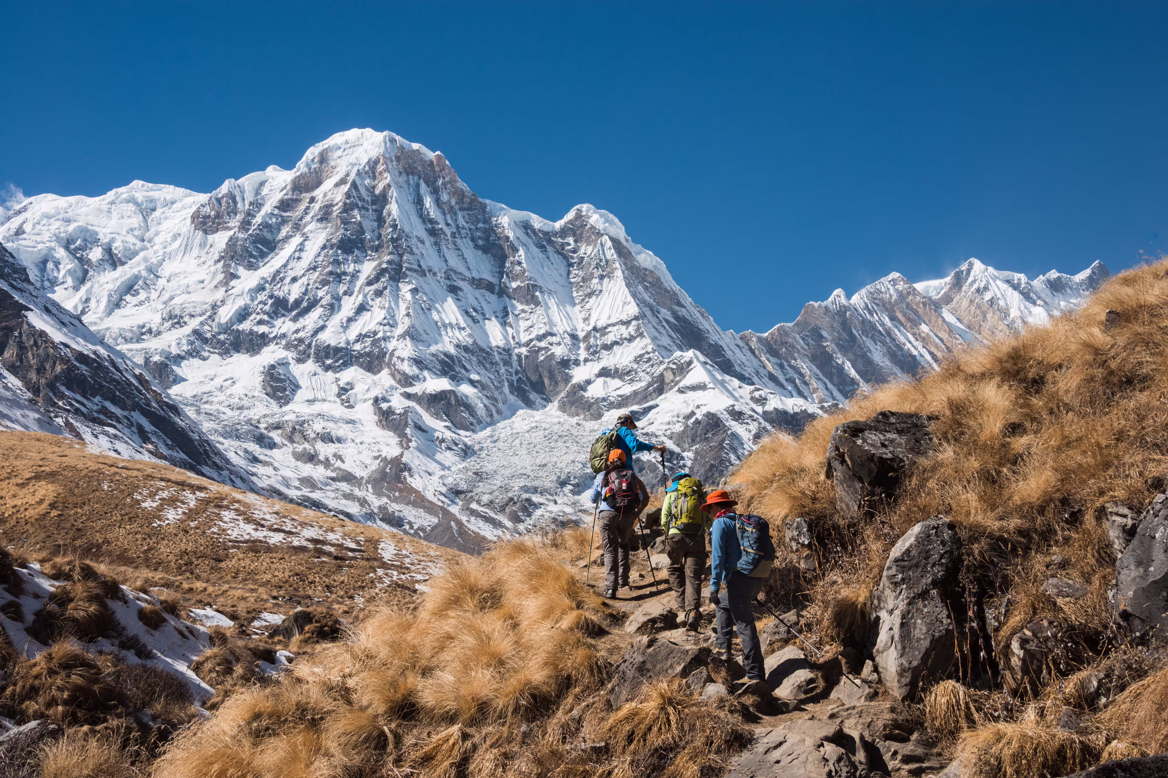 Trekking in Annapurna region, with Annapurna South in background, Nepal