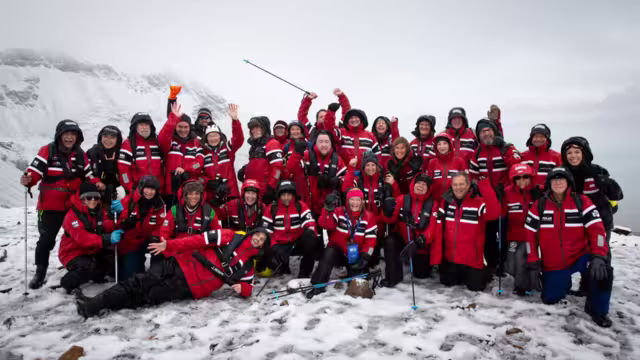 Celebrate your first time on the Antarctic continent with new friends