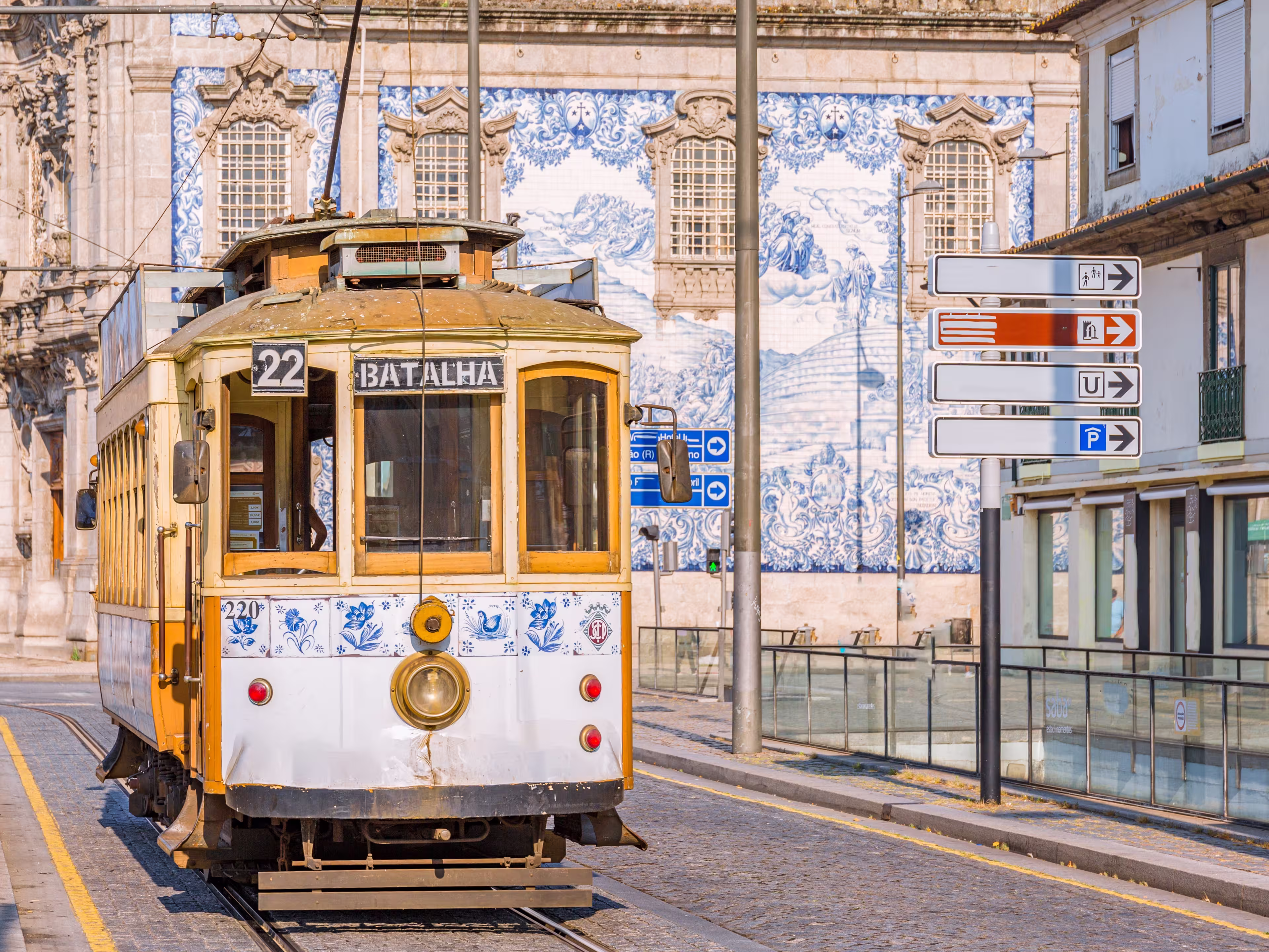 Tram and tiles on the buildings of Porto, Portugal