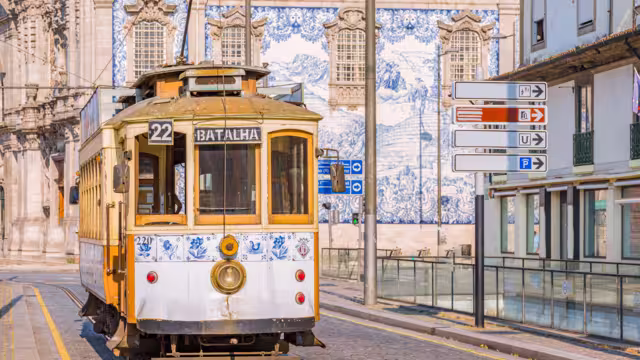 Tram and tiles on the buildings of Porto, Portugal
