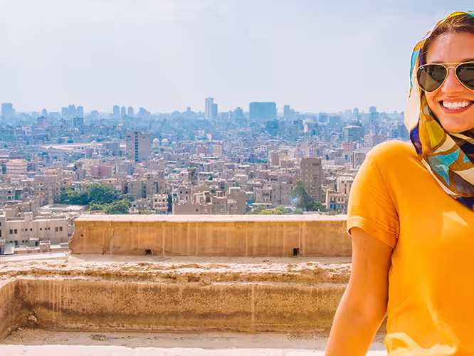 Traveller enjoys rooftop panoramic views of Cairo