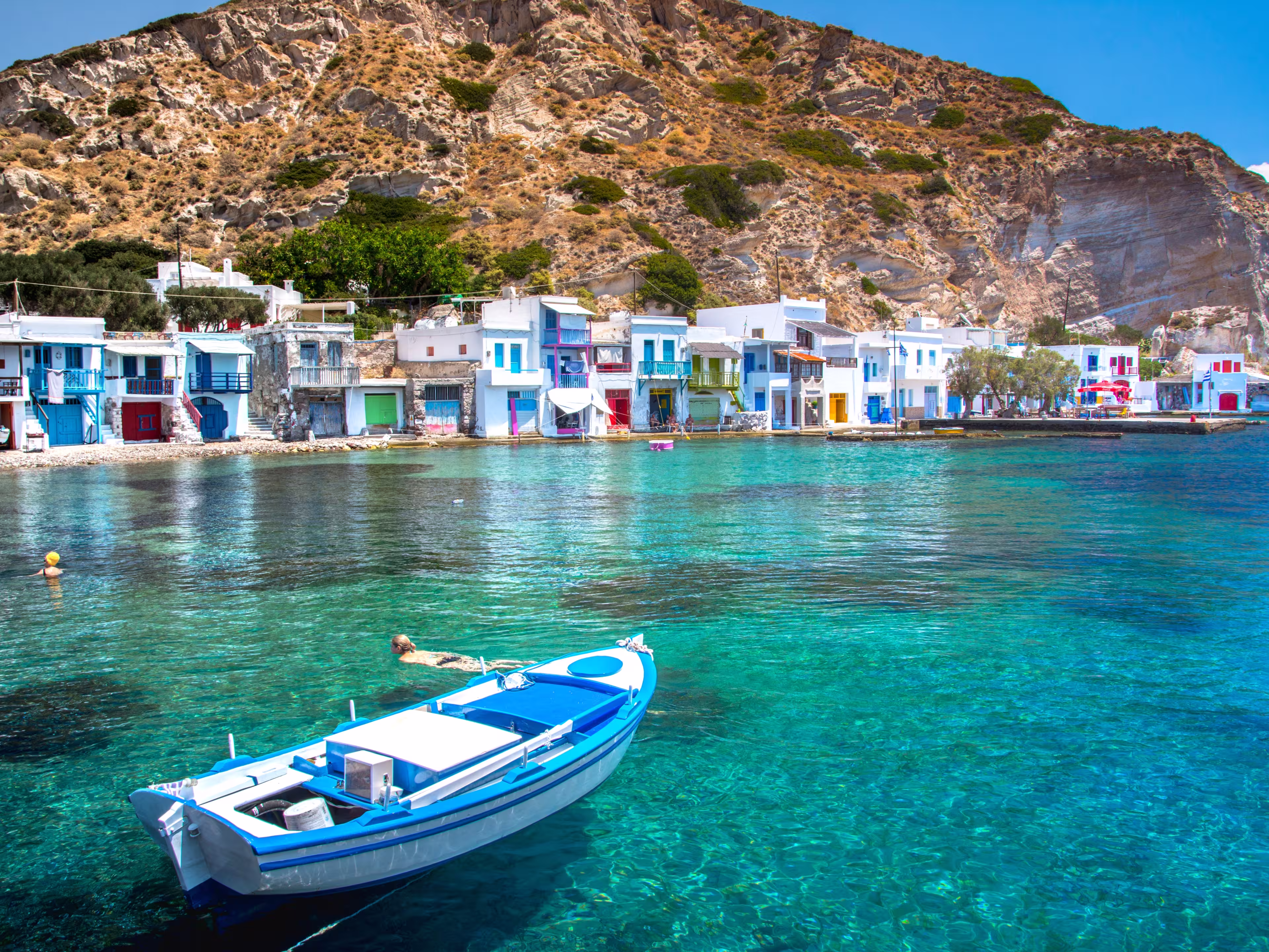 Scenic Klima village (traditional Greek village by the sea, the Cycladic-style) with sirmata - traditional fishermen's houses, Milos island, Cyclades, Greece.