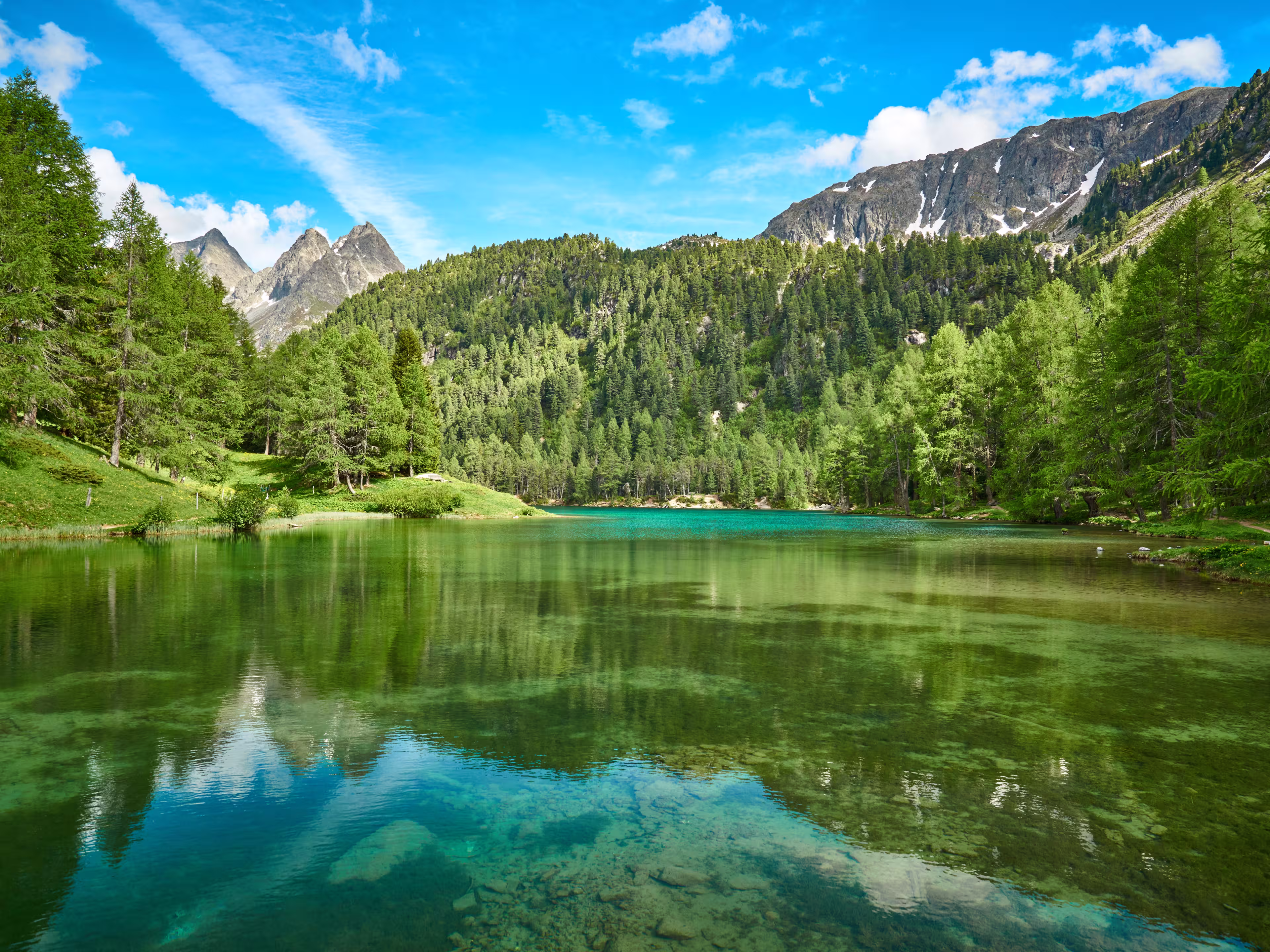 Landscape panorama of Lai da Palpuogna / Palpuognasee, mountain lake, Albula Pass in the municipality of Bergün, in the Grisons, Switzerland