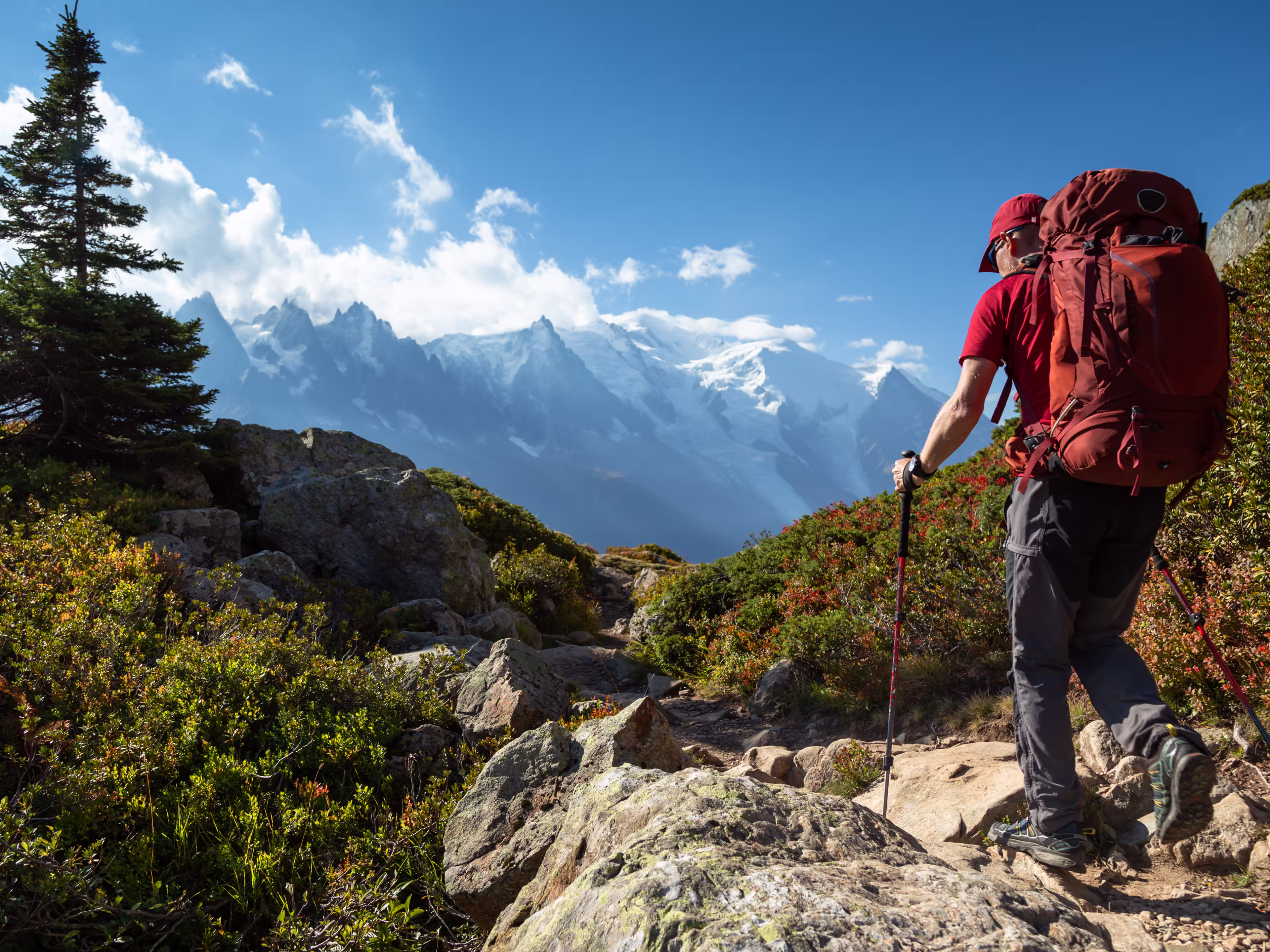A man hiking on the famous Tour du Mont Blanc near Chamonix, France.