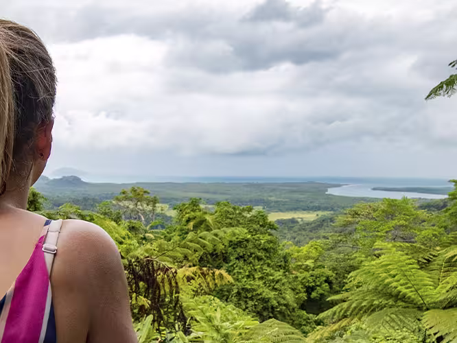 Traveller overlooking Cape Tribulation in Queensland, Australia