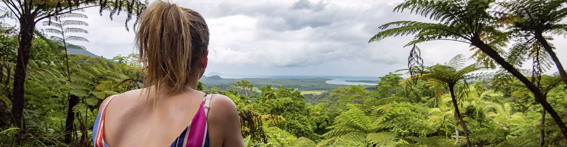 Traveller overlooking Cape Tribulation in Queensland, Australia
