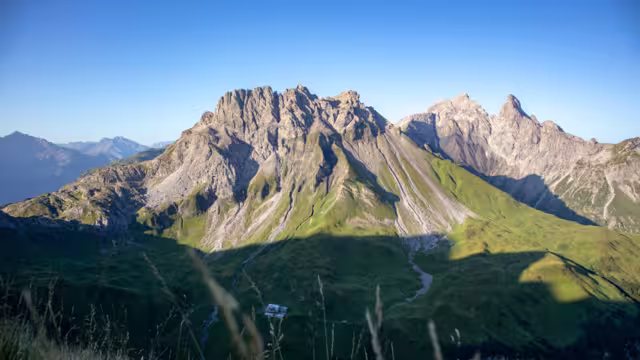 Summer mood in the Allgäu Alps with view to the Kemptner Hütte (hut)